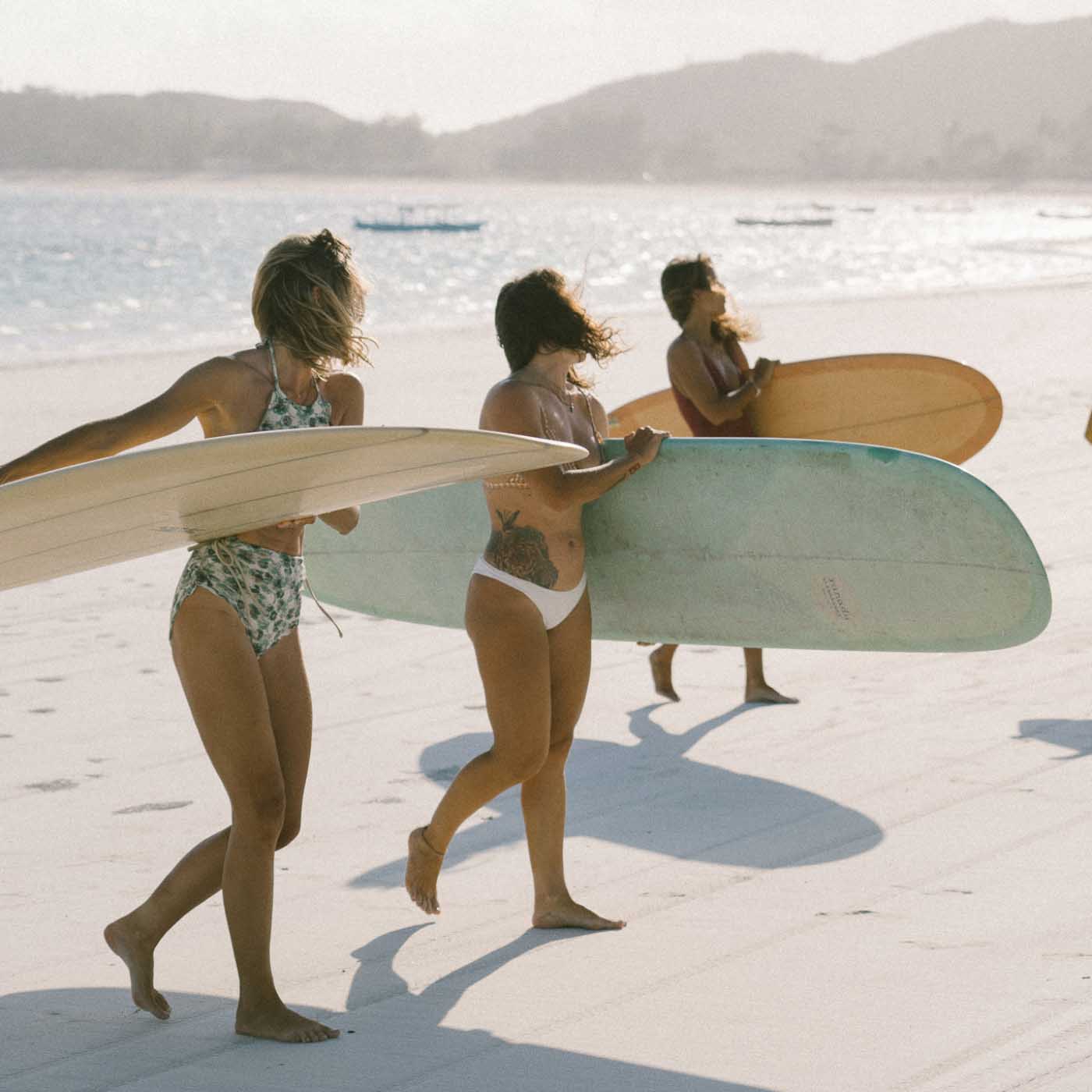 Girls Surfing at Xanadu Surf & Yoga